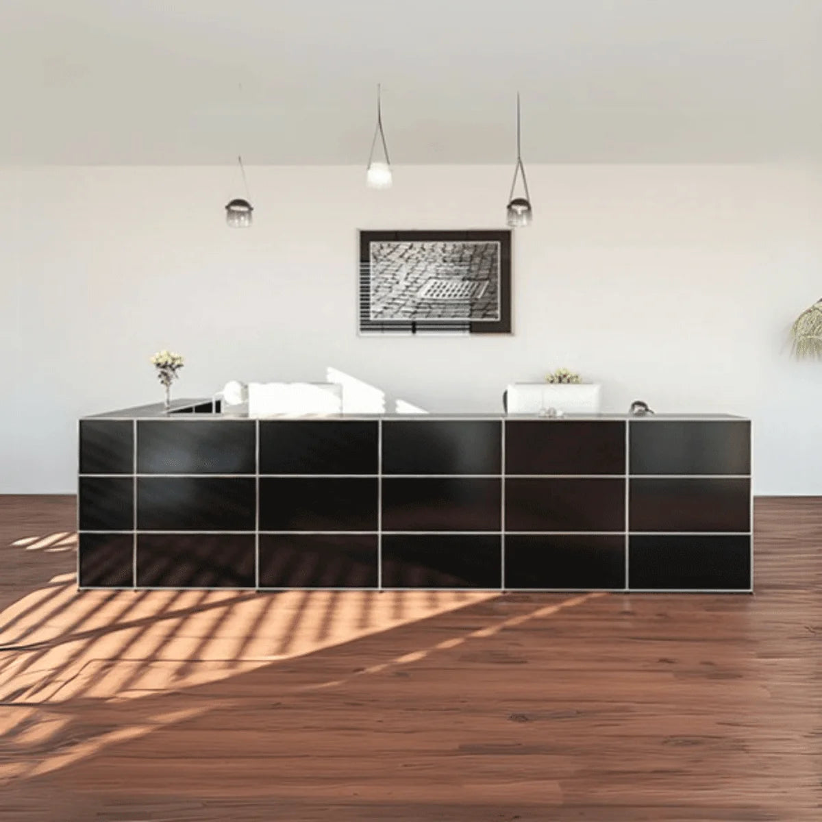 Moderne USM Haller Empfangstheke in Schwarz mit klarer Linienführung