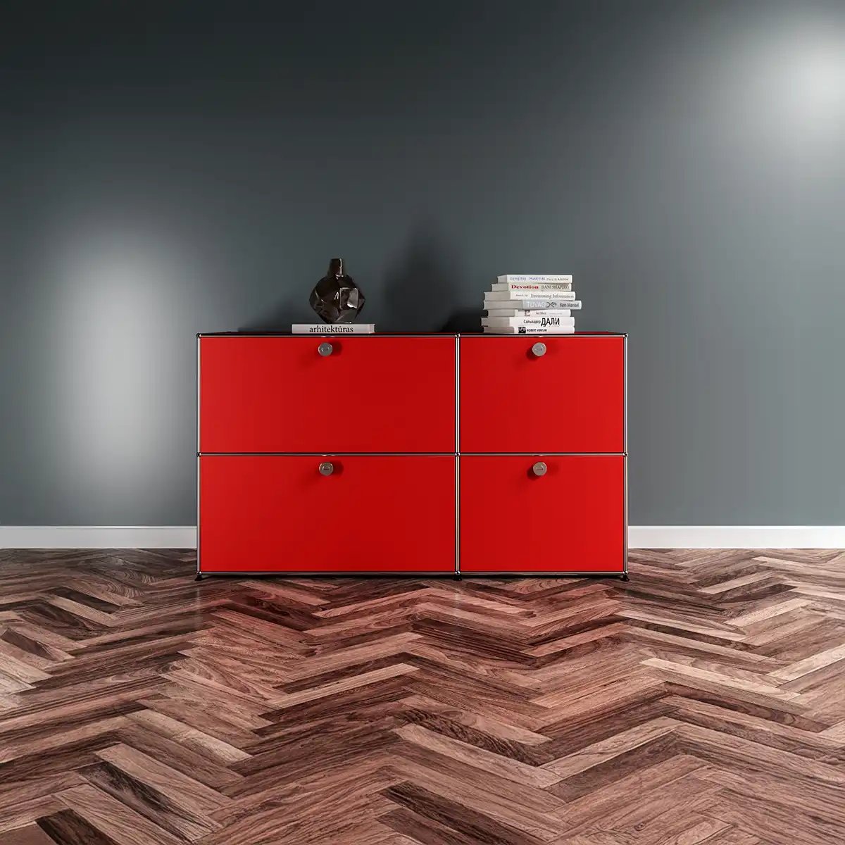 USM Haller Sideboard im Showroom mit 4 Klapptüren in rubinrot von USM Markt